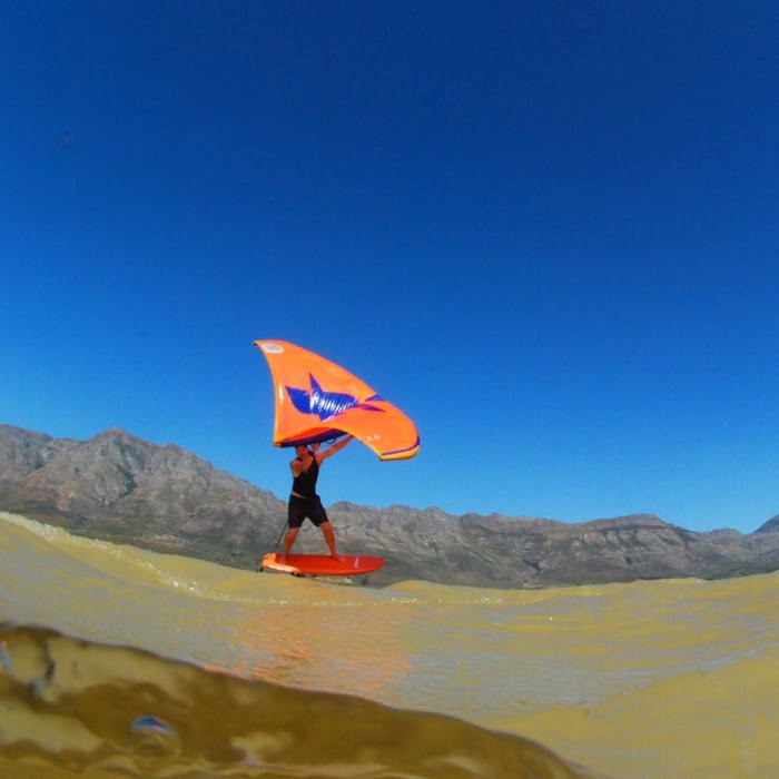 Wing surfing on a dam